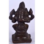 A 19TH CENTURY INDIAN BRONZE FIGURE OF GANESHA, formed upon a square base. 6.25 cm high.