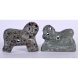 A PAIR OF CENTRAL ASIAN CARVED STONE PENDANTS, formed as animals. 6 cm wide.