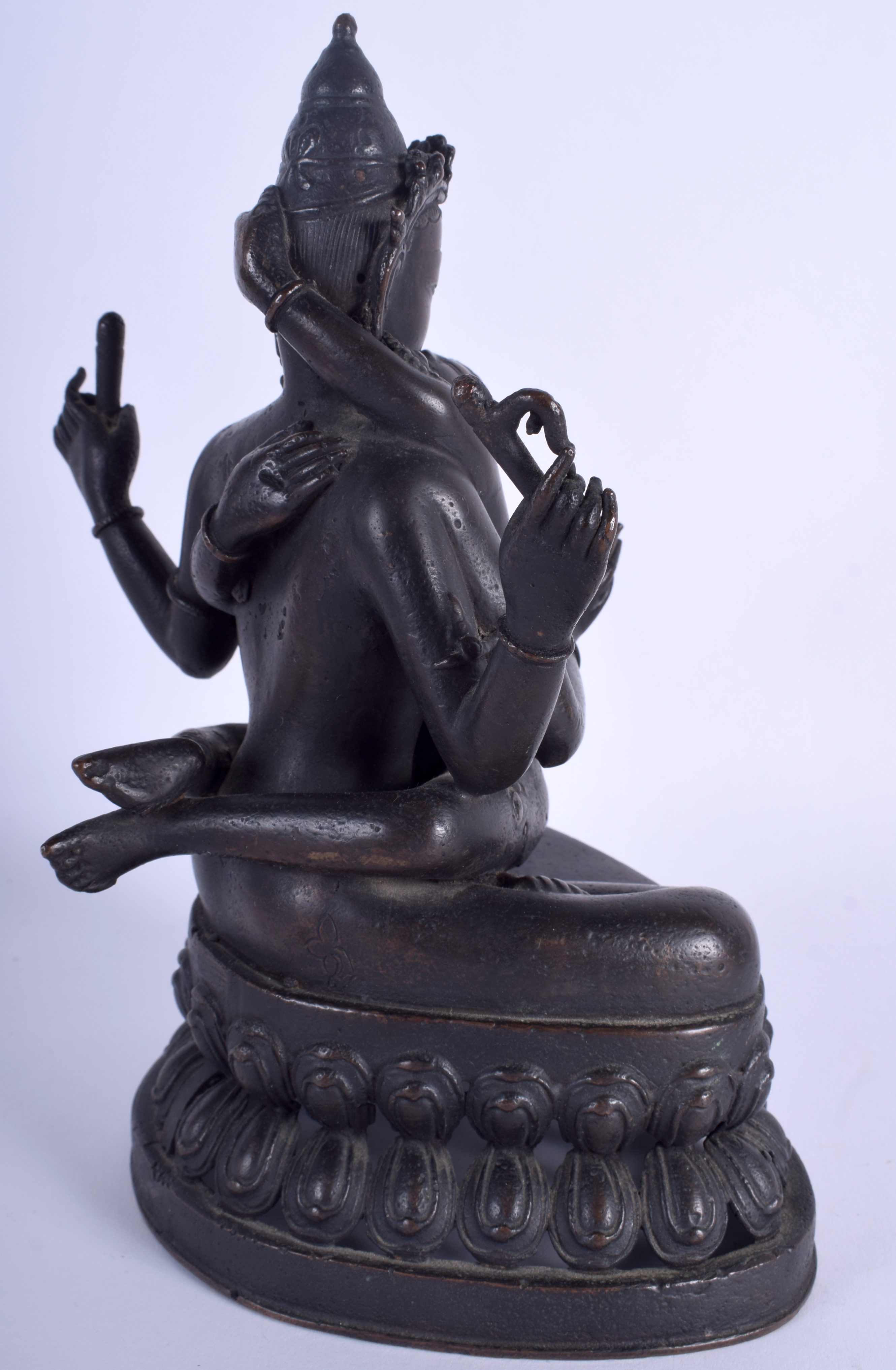 AN 18TH/19TH CENTURY CHINESE TIBETAN NEPALESE INDIAN BRONZE BUDDHA of erotic inspiration. 23 cm x 1 - Image 3 of 4