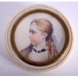 A MID 19TH CENTURY CARVED IVORY BOX AND COVER inset with a portrait miniature of a female. 5.75 cm