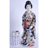 A 19TH CENTURY JAPANESE MEIJI PERIOD FIGURE OF GUANYIN painted with flowers. 36 cm high.