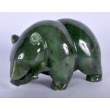 A VINTAGE CONTINENTAL CARVED NEPHRITE FIGURE OF A BEAR modelled holding a fish within its mouth. 11