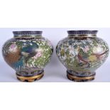 A VERY FINE PAIR OF 19TH CENTURY CHINESE CLOISONNE ENAMEL BULBOUS VASES Qing, decorated with peacoc