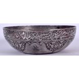 A 19TH CENTURY PERSIAN WHITE METAL BOWL, decorated with calligraphy. 17.5 cm wide.