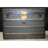 A LARGE VINTAGE LOUIS VUITTON GREEN TRAVELLING TRUNK with wooden strap banding, No 03476. 56 cm x 8