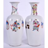 A PAIR OF CHINESE FAMILLE ROSE PORCELAIN VASE BEARING DAOGUANG MARKS, decorated with figures and ca