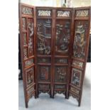 A CHINESE HARDWOOD FOUR FOLD SCREEN Republic, carved with figures within landscapes. 103 cm x 72 cm