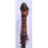 AN UNUSUAL ANTIQUE TRIBAL CARVED AND STAINED BONE AND HORN STAFF of figural form. 92 cm long.