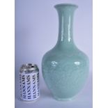 AN EARLY 20TH CENTURY CHINESE CELADON BULBOUS VASE bearing Qianlong marks to base. 31.5 cm high.