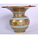 A RARE CHINESE CELADON GILT DECORATED SPITTOON bearing Qianlong marks to base. 17 cm x 21 cm.