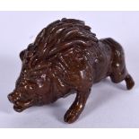 A JAPANESE BRONZE OKIMONO IN THE FORM A WARTHOG, signed. 5.5 cm wide.