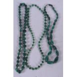 THREE MALACHITE NECKLACES, varying form. Longest 54 cm. (3)