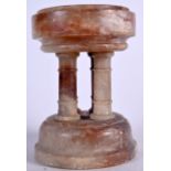 A 19TH CENTURY GRAND TOUR MARBLE FONT, formed with four column supports. 22.5 cm x 16 cm.