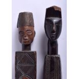 TWO TRIBAL EARLY 20TH CENTURY AFRICAN COLONIAL HARDWOOD STAFFS with portrait terminals. 105 cm long