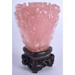 A 19TH CENTURY CHINESE CARVED ROSE QUARTZ SCENT BOTTLE carved with figures. Bottle 6 cm x 5 cm.