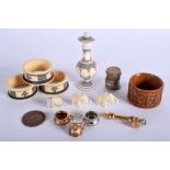 A 19TH CENTURY ANGLO INDIAN CARVED IVORY VASE together with napkin rings etc. (qty)