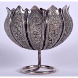 AN EARLY 20TH CENTURY INDIAN SILVER BOWL ON STAND, decorated with panels of foliage. 8.5 cm high.