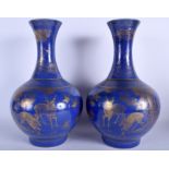 A RARE PAIR OF 19TH CENTURY CHINESE POWDER BLUE BULBOUS VASE Qing, unusually gilded with spotted de