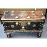A 17TH/18TH CENTURY CONTINENTAL WOODEN TRUNK possibly Nepalese, depicting brass Buddhistic figures.