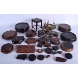 A COLLECTION OF 19TH/20TH CENTURY CHINESE AND JAPANESE STANDS in various forms and sizes. (qty)