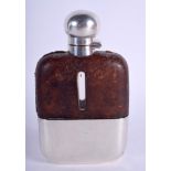 A VINTAGE SILVER AND LEATHER HIP FLASK. Sheffield 1925. 8 cm x 14 cm.