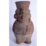 AN ANTIQUE PRE COLUMBIAN SOUTH AMERICAN POTTERY FIGURAL VASE. 23.5 cm high.