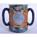A LARGE ROYAL DOULTON STONEWARE ROPE HANDLED LOVING CUP C1903-1905, commemorating Lord Nelson. 14 c