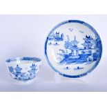 A 18TH CENTURY LOWESTOFT TEA BOWL AND SAUCER painted in bright blue with pagodas on an island. (2)