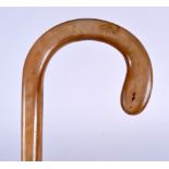 A GOOD EARLY 20TH CENTURY FULL LENGTH RHINOCEROS HORN HANDLED WALKING STICK, formed with an ivory f