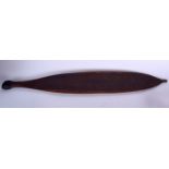 AN ANTIQUE AUSTRALIAN ABORIGINAL WOOMERA SPEAR THROWER, carved “zig-zag” motifs. 78 cm long.