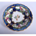 A 18TH C CHELSEA GOLD ANCHOR PERIOD PLATE painted with birds in gilded panels on a mazarine blue gr