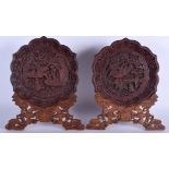A PAIR OF 19TH CENTURY CHINESE CARVED CINNABAR LACQUER DISHES upon original stands. Dish 22 cm wide