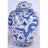 A LARGE CHINESE BLUE AND WHITE PORCELAIN JAR AND COVER, painted with dragons and the phoenix bird,