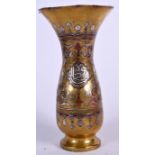 AN ISLAMIC BRASS SILVER INLAID VASE, decorated with script and symbols. 23.5 cm high.