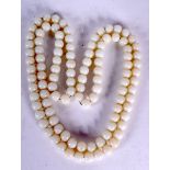 A CHINESE LONG STRAND HARDSTONE BEAD NECKLACE, formed with spherical beads. 134 cm long.