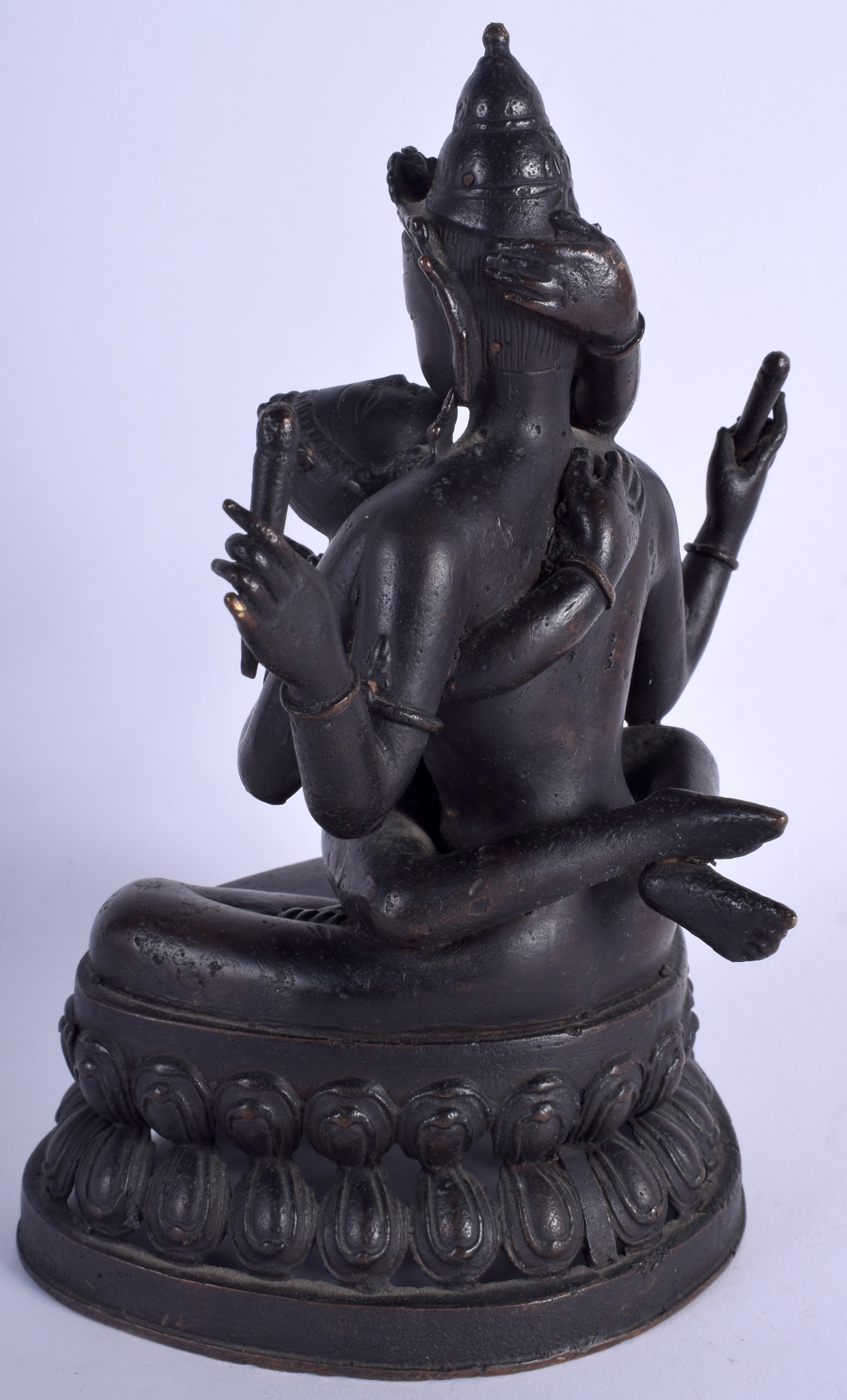 AN 18TH/19TH CENTURY CHINESE TIBETAN NEPALESE INDIAN BRONZE BUDDHA of erotic inspiration. 23 cm x 1 - Image 2 of 4