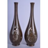 A LOVELY PAIR OF 19TH CENTURY JAPANESE MEIJI PERIOD SILVER INLAID BRONZE VASES decorated with geish