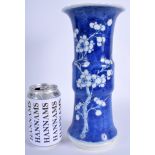 A 19TH CENTURY CHINESE BLUE AND WHITE GU SHAPED BEAKER VASE bearing Kangxi marks to base. 26 cm hig