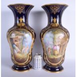A VERY LARGE PAIR OF 19TH CENTURY FRENCH PARIS PORCELAIN VASES Sevres style, painted with classical