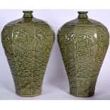 A LARGE PAIR OF CHINESE CELADON GLAZED PORCELAIN VASES, decorated in relief with the eight immortal