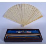 A 19TH CENTURY CHINESE CANTON IVORY FAN Late Qing. 33 cm wide.