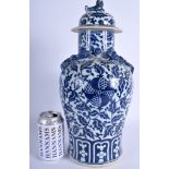 A LARGE 19TH CENTURY CHINESE BLUE AND WHITE VASE AND COVER Qing, painted with floral sprays. 39 cm