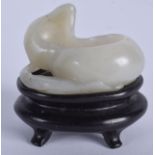 A 19TH CENTURY CHINESE GREEN JADE BRUSH WASHER Qing, of naturalistic form. 5 cm x 4 cm.