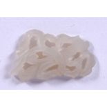 A 19TH CENTURY CHINESE WHITE JADE PLAQUE, in the form of a floral wreath. 2.8 cm wide.