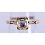 A VINTAGE 14CT GOLD AND GEM SET RING. 4 grams. L/M.