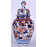 A JAPANESE MEIJI PERIOD IMARI PORCELAIN VASE AND COVER, painted with foliage. 20 cm high.