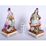 A PAIR OF 19TH CENTURY PARIS PORCELAIN FIGURES OF TURKS possibly Jacob Petit. 28 cm high.