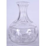A WILLIAM YEOWARD RACHEL WINE CARAFE, formed with bold floral cuts, signed. 22.5 cm x 15 cm.