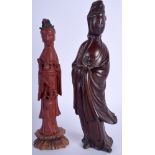 AN EARLY 20TH CENTURY CHINESE CARVED FIGURE OF GUANYIN together with another. 26 cm & 22 cm. (2)