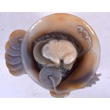 A 20TH CENTURY CHINESE AGATE BOWL, carved internally with a lucky toad. 14 cm wide.